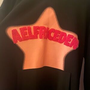 Aelfric Eden embroidered Star Cutout Sweatshirt with Red Lettering.